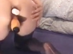 Brunette in black nylons toying her hairy pussy