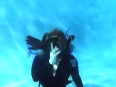 Elise Diving in wetsuit