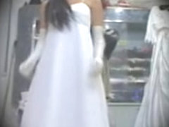Asian bride spied in lingerie trying on the luxurious dressed