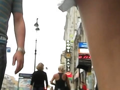 Marvelous babes are being filmed upskirt in public