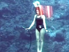 Barefoot mermaid scuba training