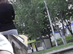 Amateur upskirt scene with a girl walking on the street