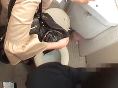 Japanese pussy licked in a rough manner in public toilet