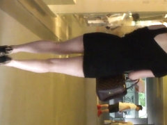 Upskirt - Girl in tight miniskirt and leopard pump
