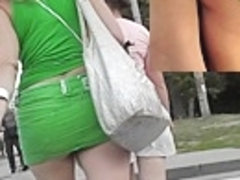 Peekig up super short green mini petticoat