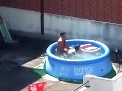 Man and woman fucking in the pool