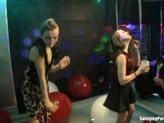 Lesbian pornstars having fun in a club
