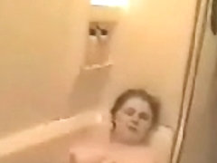 My chubby mum fingering pussy in bathtube