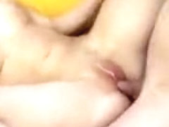 Bespectacled coed with nice tits gives head and gets her shaved cunt fucked on the couch