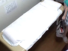 Voyeur massage video showing a Japanese gal finger fucked