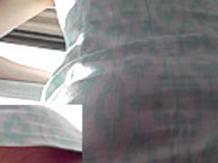 The upskirt view of the young lady in the tight skirt