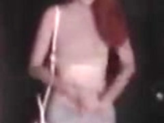Redhead college girl pees her tight pants after waiting too long