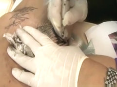 Tabitha gets a tattoo in her pussy