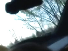 Girl sucks a fat guy's cock like crazy with condom in his car and fucks