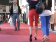 Street candid video with sexy blonde in red pants