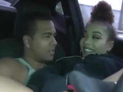 Couple having sex in a car