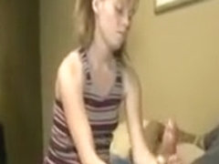 Pigtailed teen strokes dick on hotel room