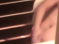 Sexy voyeur video of a hot white bitch showering
