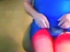 Blue shiny dress, red nylons, and red high heels tease!