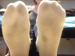 Dirty white socks in black boots POV