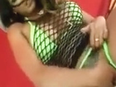 Sex bomb working her pussy and tits in close-ups outdoor