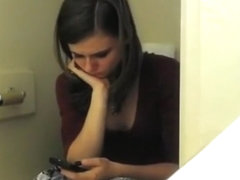 Teen spied in toilet pissing