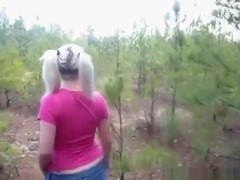Pigtailed blonde sucks her bf's cock in the forest with tit cumshot