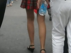 Street upskirt of cute babe with school uniform skirt