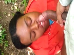 Black chick sucking her man and getting a facial in the park