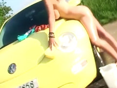 Stunning Roxy washes a car and masturbates