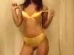 Petite girl stripteases on webcam