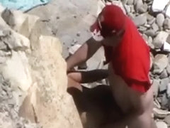 Blowjob and fuck in rocky seashore