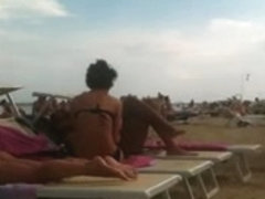 Perfect tan ass on the beach