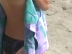 Slender legal age teenager with merry bumpers stripped at a nudist beach