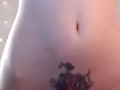Tatooed red head shaved cameltoe pussy pert tits teasing