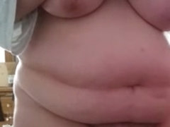 Fat butted mature spied lying on belly and masturbating