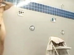 Muscular Asian marine takes a long shower
