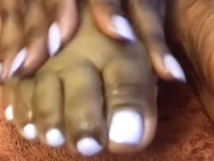 SEXFEENE OILS UP HER SEXY PRETTY EBONY SOLES