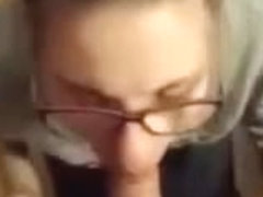 Cute blonde girl with glasses sucks dick