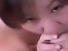 Thick Asian Woman Sucking On A Cock