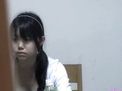 Cute Japanese lady filmed through the window on amateur spy cam