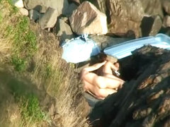 Nudist couple fucking in the rocks