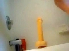 Amateur girlfriend rides dildo toy in the bathroom