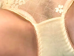 Alluring yellow panties are visible in the upskirt video