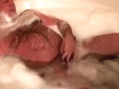 Daddy jerks off in the tub