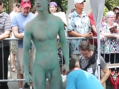 Naked Asain lad's body painted in Public