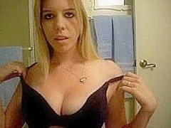 Horny sexy blonde w/ big tits strips
