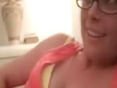 Blondie in glasses shows sexy tits and twat