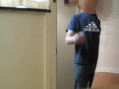Girl in white t-shirt flashing naked butt cheeks on cam