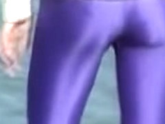 Candid amateur in lilac pantyhose walking along the quay 03zm